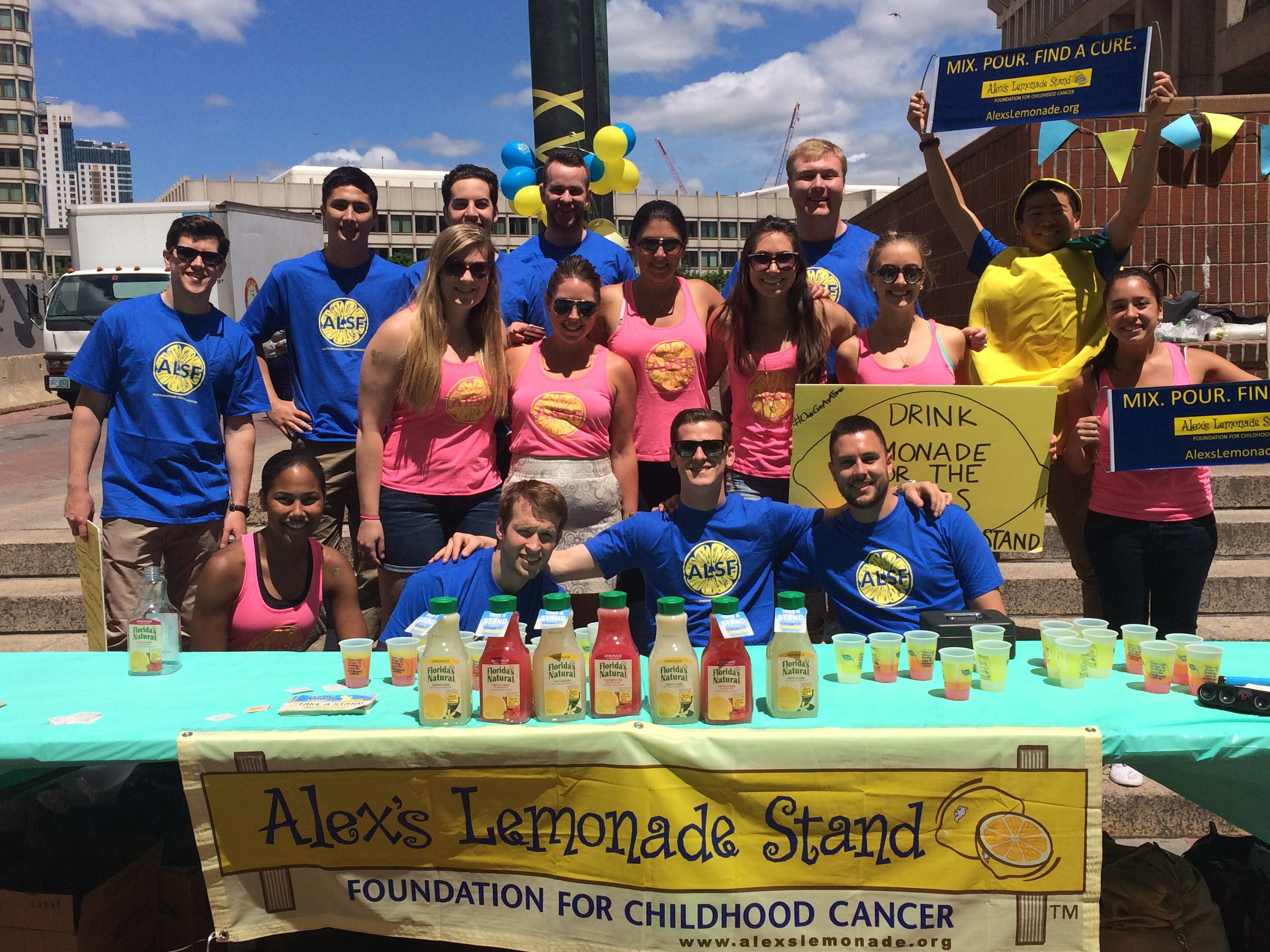 Group of Northwestern Mutual employees at lemonade stand