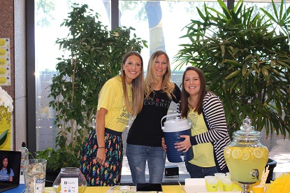 Group of coworkers at a lemonade stand
